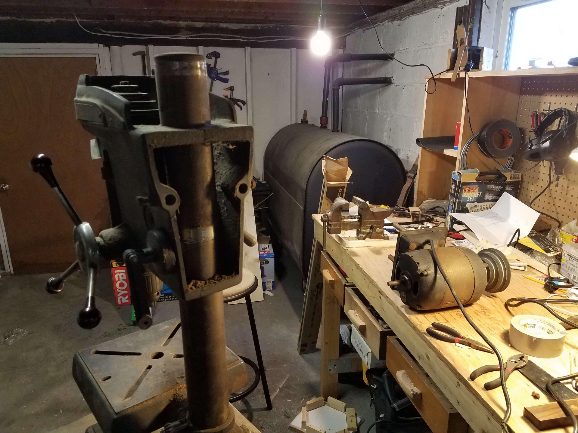 the back of the drill press with the motor removed